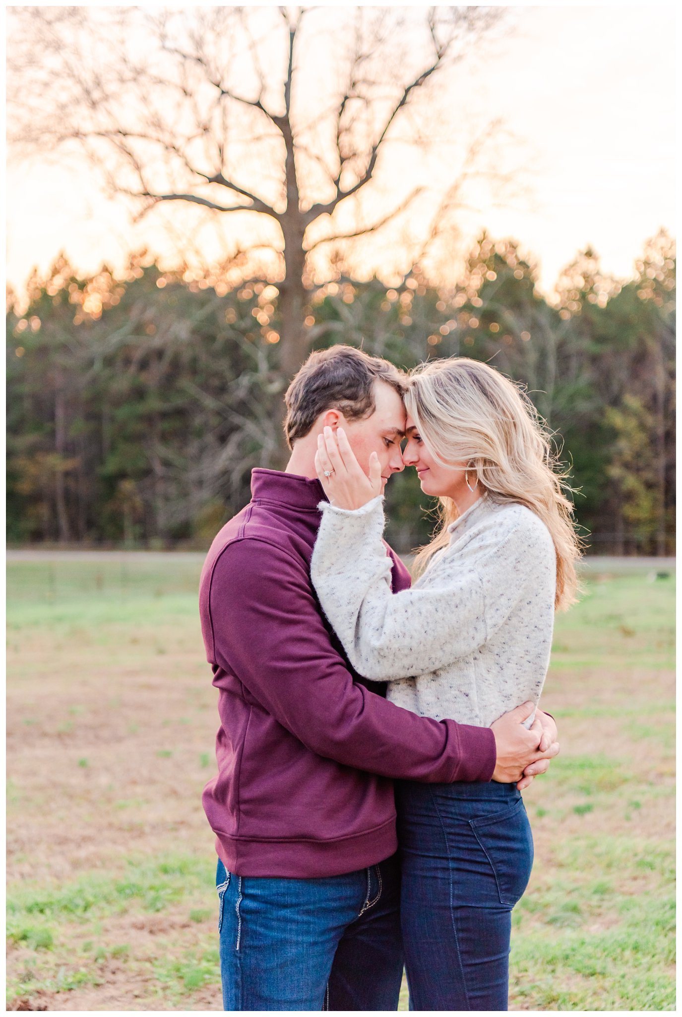 couple in a field for their farm engagement