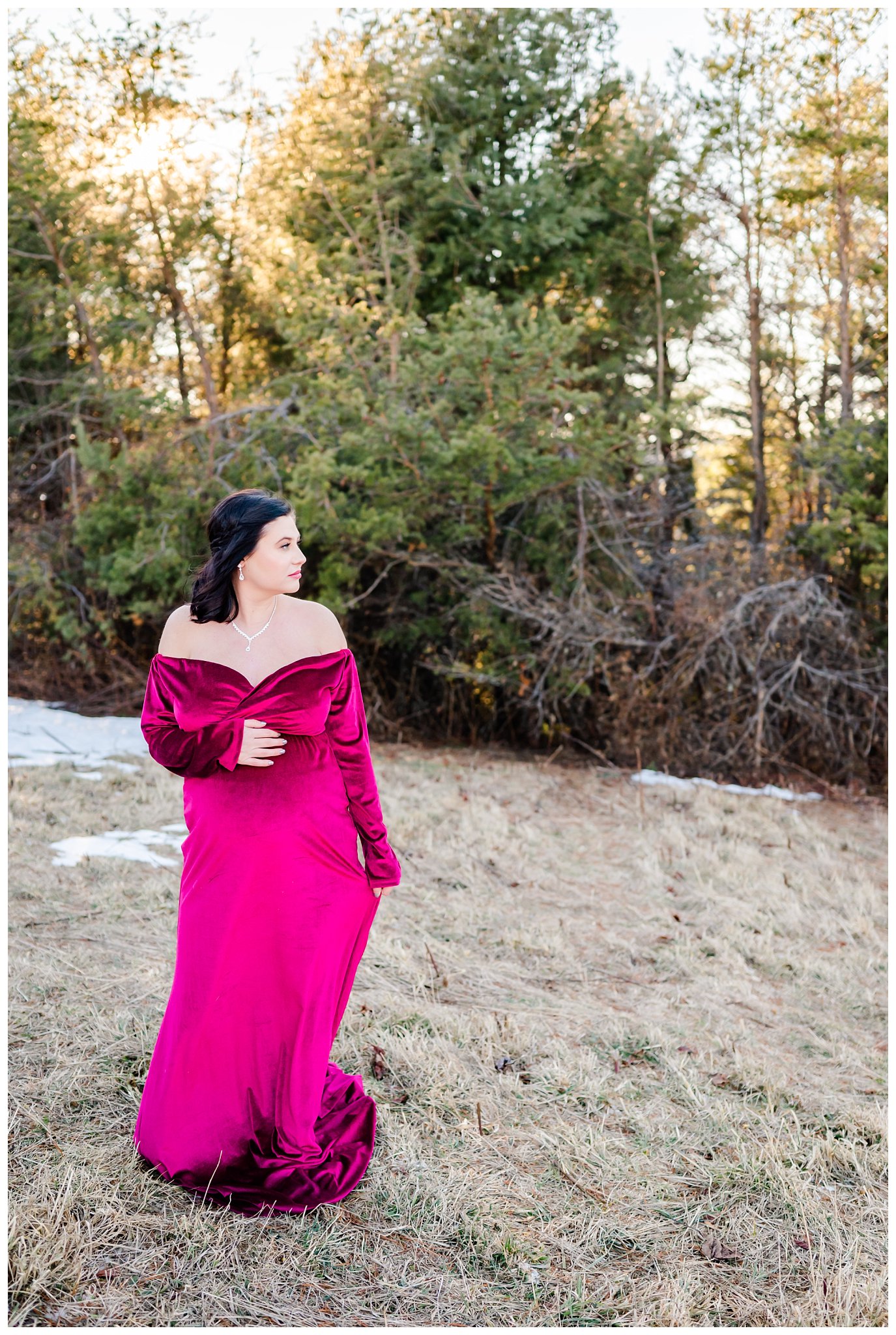 winter maternity session with snow on the ground