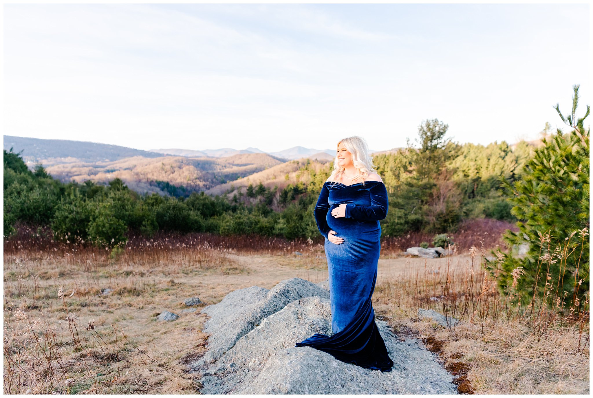 mom in blue dress for mountain maternity session