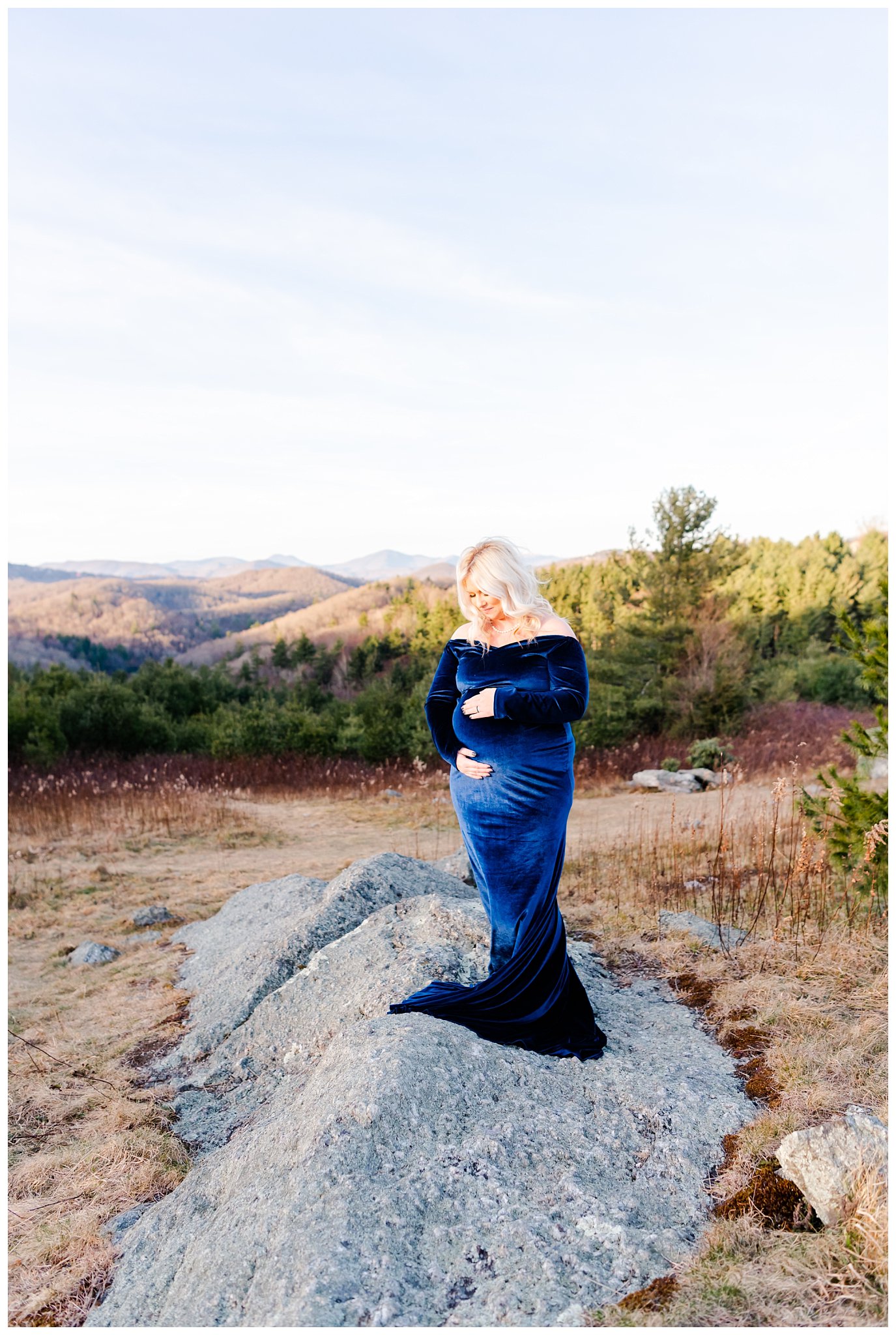 mother in blue dress for mountain maternity session