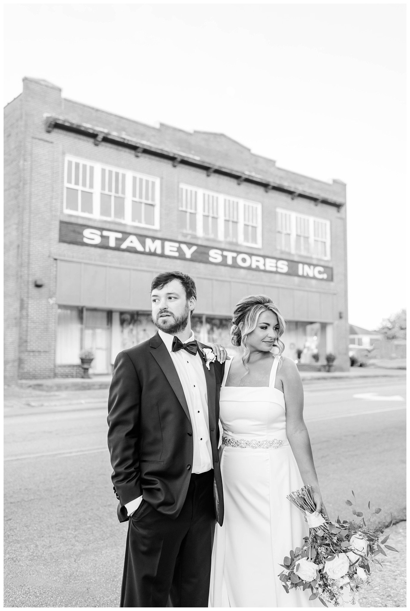 black and white photo of bride and groom in downtown Fallston, NC