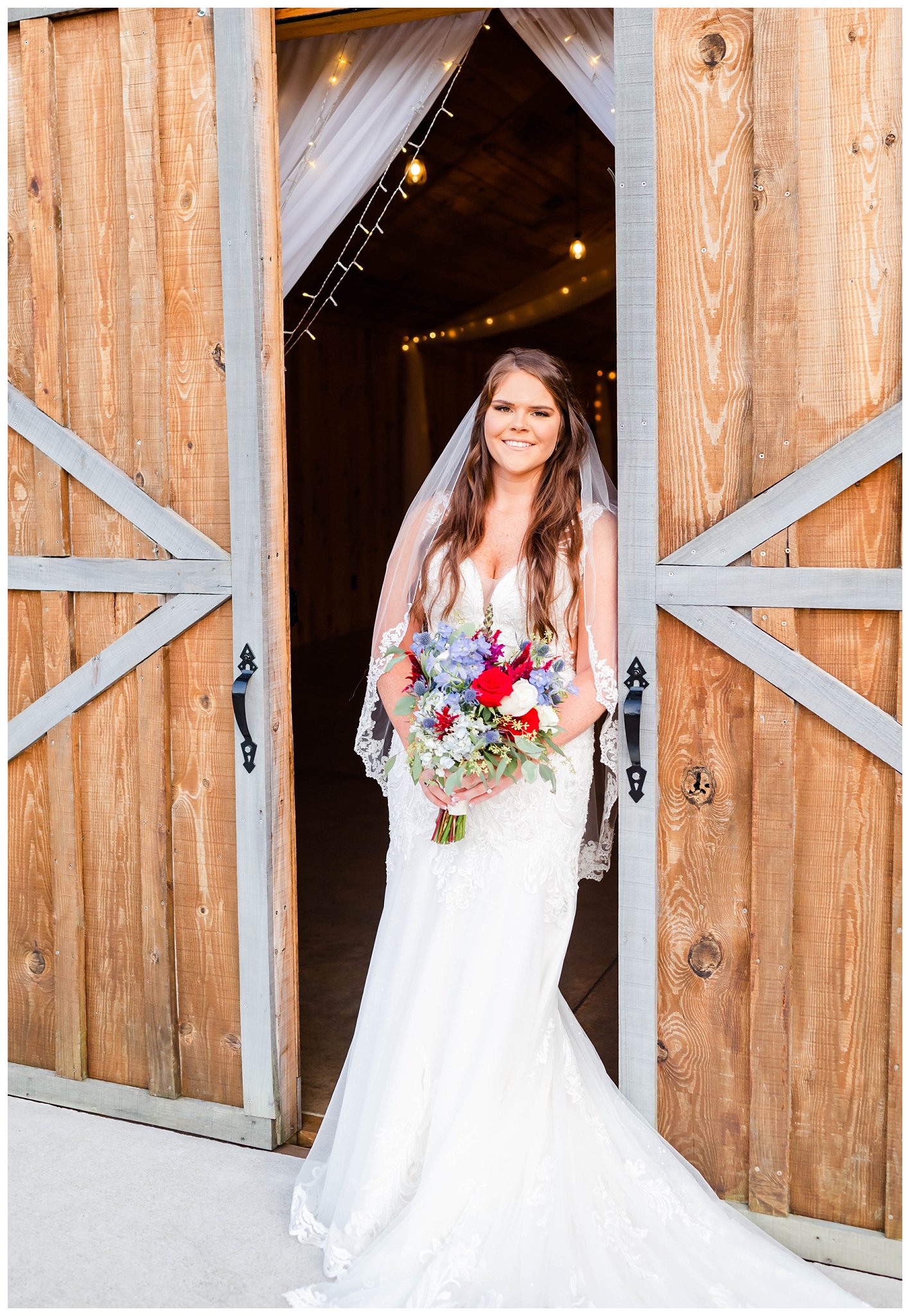 Nicole posing in front of barn for her rustic bridal portraits